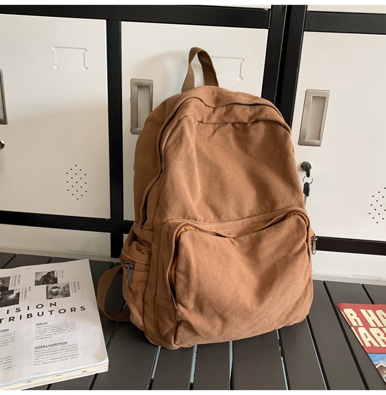 上 海休闲双肩包潮流水洗帆布新款大学生书包上课包街头百搭帆布袋